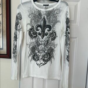 Black and White Fleur-de-Lis Long Sleeve Tee. Brand name says Cottyon